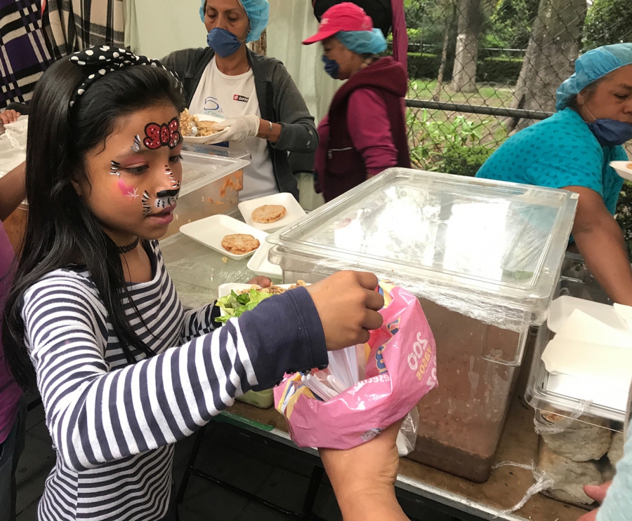 A girl gets a meal at the Cuauhtémoc shelter, following the Mexico City earthquake. A girl gets a meal at the Cuauhtémoc shelter, following the Mexico City earthquake.